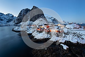 Fishermen cabins rorbu in the Hamnoy village at twilight in winter season, Lofoten islands, Norway