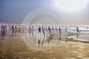 Fishermen cathing fish in early morning time after whole night fight coming shore back to home from the oumb of ocean everyday