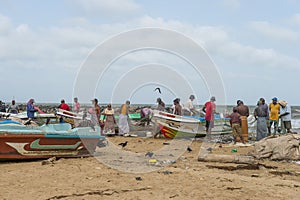 Fishermen checking the nets at the beach