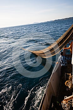 Fishermen choose a trawl with fish