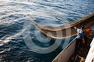 Fishermen choose a trawl with fish