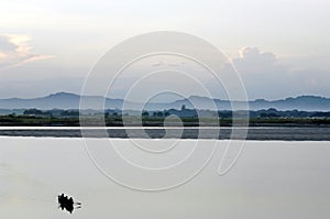 Fishermen crossing Inle Lake in Burma