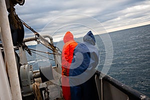 Fishermen on the deck of fishing vessel