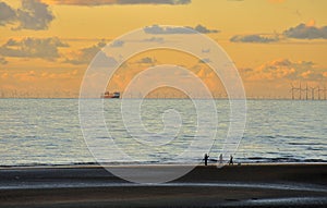 Fishermen, ferry and turbines