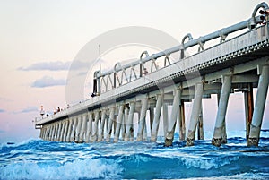 Fishermen fishing in the beautiful ocean of The Spit, Gold Coast, Australia