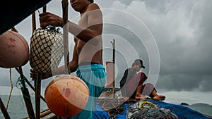 Fishermen in fishing boat at Ko Chang Island Ranong Province Thailand