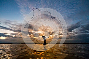 Fishermen fishing by fishnet
