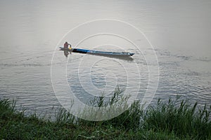 Fishermen fishing river