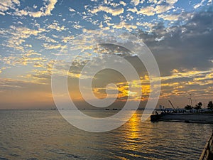 Fishermen fishing at sunset on the shores of the Sea of Marmara in Istanbul Turkey