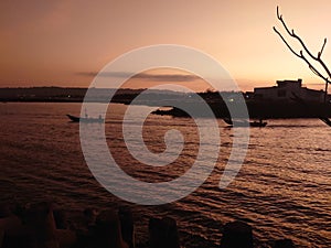 fishermen go looking for sustenance at dusk