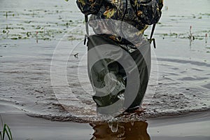 Fishermen and hunters use waders photo
