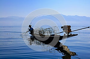 Fishermen in Inle lake, Myanmar photo