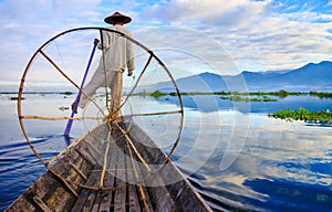 Fishermen in Inle Lake at sunrise, Shan State, Myanmar photo