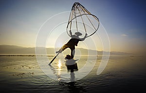 Fishermen in Inle Lake at sunrise, Shan State, Myanmar