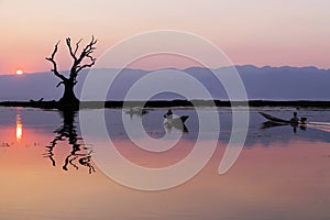 Fishermen in Inle lakes sunset, Myanmar.