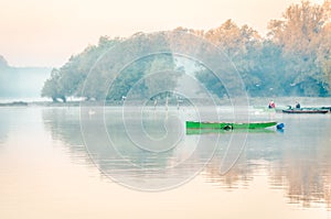 Fishermen in the lake