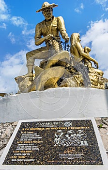 Fishermen memorial statue on Isla Mujeres,Mexico photo