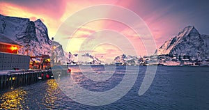 Fishermen, nets, fishing boat on arctic sea harbor, Lofoten Islands, Norway, Europe