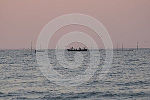fishermen with nets to catch fish