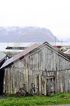 Fishermen Old Log Cabin, Bike and Harbor_Norway