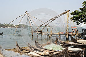 Fishermen operate a Chinese fishing net