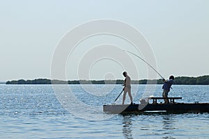 Fishermen on pier