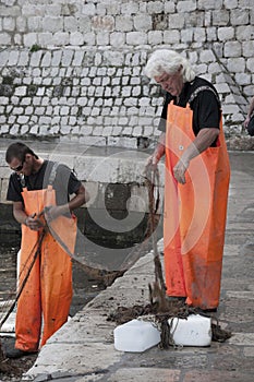Fishermen in the Port of Dubrovnic in Croatia Europe
