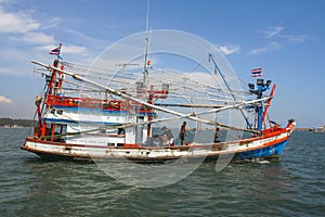 Fishermen prepare the boat for the daily catch in Koh Samet