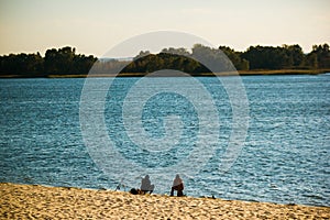 Fishermen, river and beach