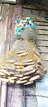 Fishermen's fishing nets hanging on wooden walls