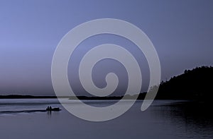 Fishermen Silhouette in Blue Twilight