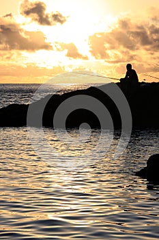 Fishermen at sunset