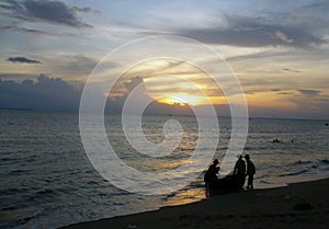 Fishermen at sunset