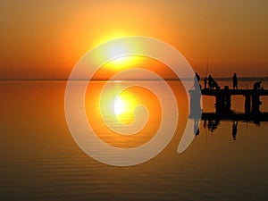 Fishermen at sunset