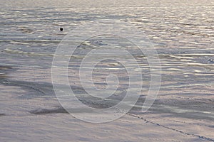 Fishermen walking on the frozen sea