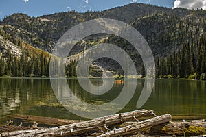 Fishermen in a yellow rubber raft on Snowslide Lake