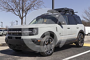 Ford Bronco display at a dealership. Broncos can be ordered in a base model or Ford has up to 200 accessories for off-road use