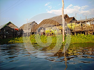 A fishers house at the river in burma