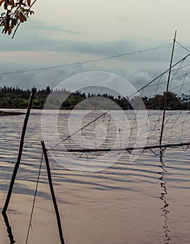 Fishers net setup on Thu Bon river in Vietnam