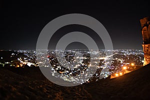 Fisheye shot of jodhpur city lights at night showing the cityscape from the roof of mehrangarh fort