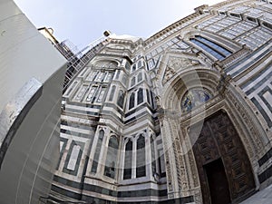fisheye unusual view Cathedral Santa Maria dei Fiori, Brunelleschi Dome and Giotto Tower in Florence Italy