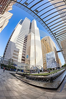 fisheye view of historic skyscraper in old town od Dallas under blue sky