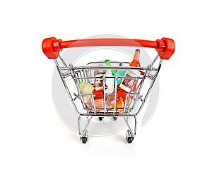 Fisheye view of shopping basket or grocery cart full of groceries and shopping. Isolated on white