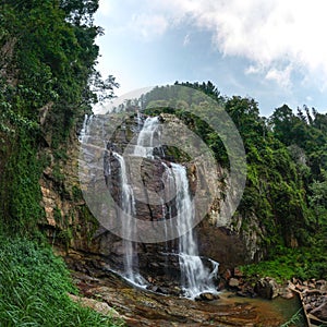 Fisheye wide shot of Ramboda Fall waterfall, Pussellawa Sri Lank