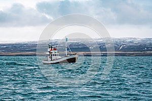 Fishin boat in open ocean