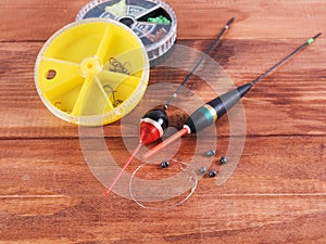 Fishing accessories - sinkers, floats and round boxes.