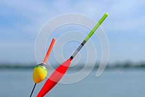 Fishing background. Fishing tackle on the background of the lake, close-up. Leisure