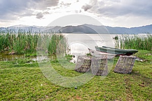 Fishing baskets and boats over Lake Jipe, Kenya