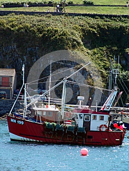 Fishing bat leaving port in Cornwall