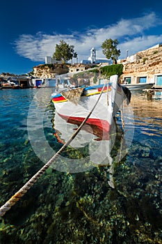 Fishing boars in harbour in fishing village of Mandrakia, Milos island, Greece